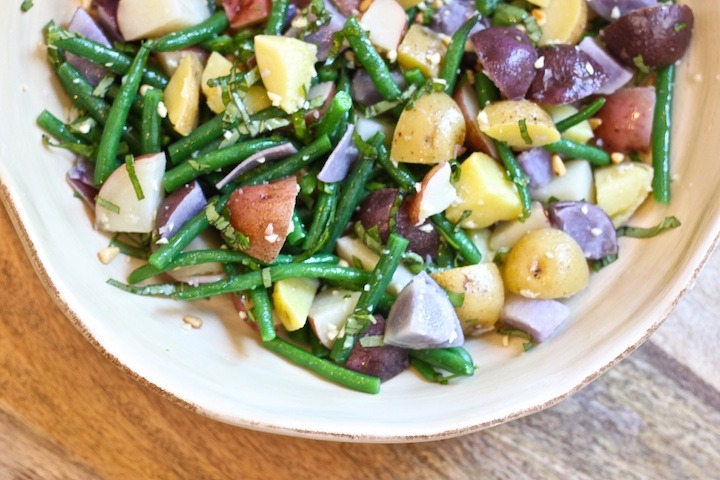 Potato Salad with Green Beans in a beige bowl